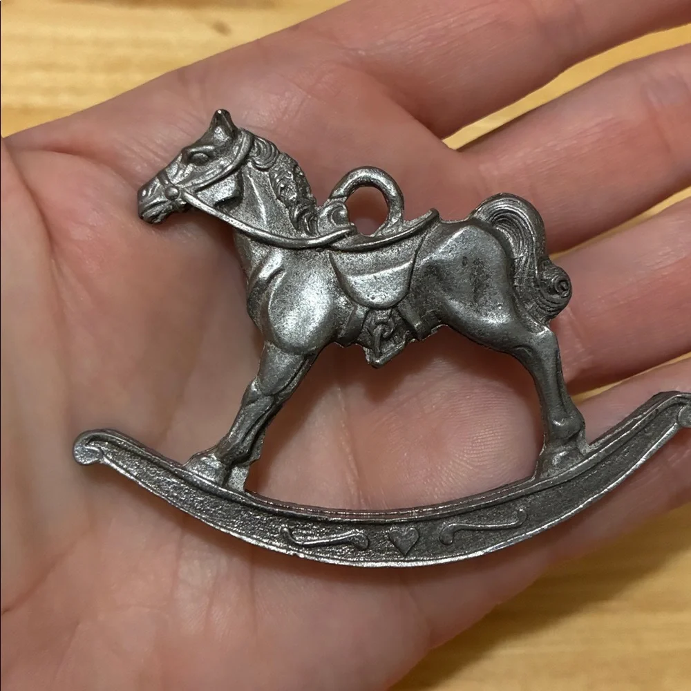 Vintage metal toy horse ornaments.  Rocking horse and stick horse